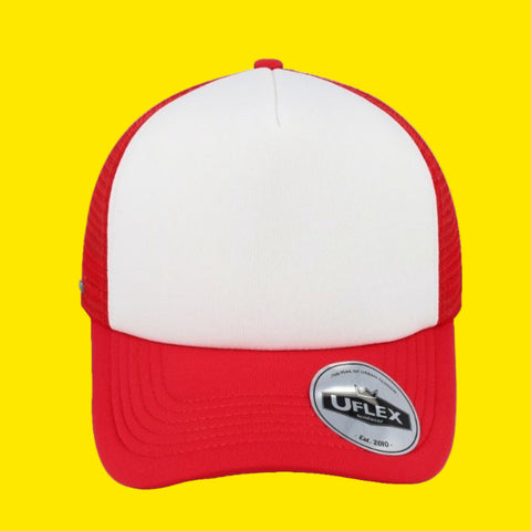 A red and white youth curved peak trucker hat with a Uflex label on the brim.